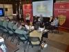 Jamie Hyder moderates a panel with Janet Zucker, Chris Lawson, Marina Dompke, and Dan Wilson.