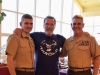 Governor Schwarzenegger talks to Lieutenant General Joseph L. Osterman and Brigadier General Sean M. Salene.